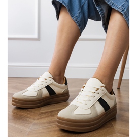 Beige women's sneakers on the platform