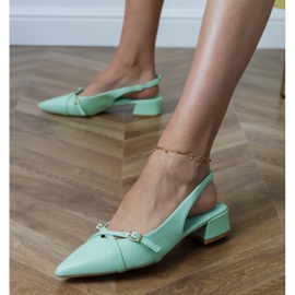 Green pumps with low -heeled heels