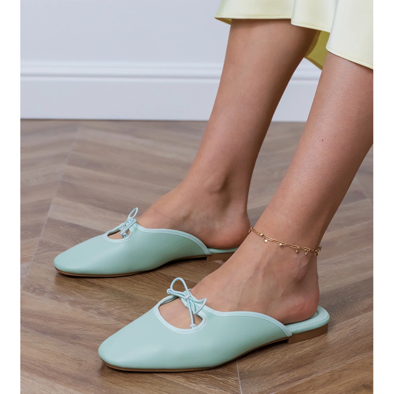 Green flip -flops built on a flat sole