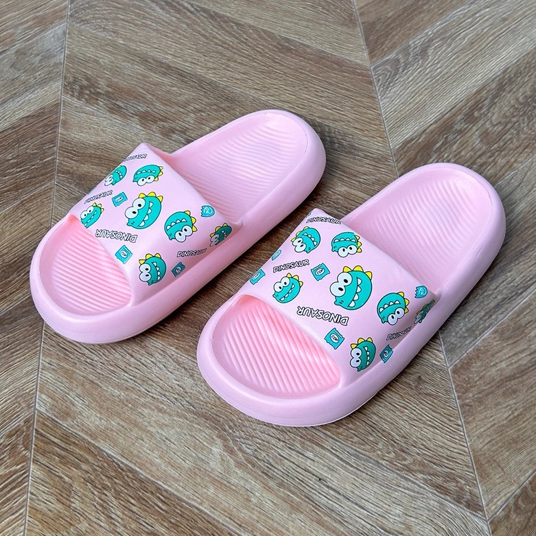 Pink children's flip flops with print