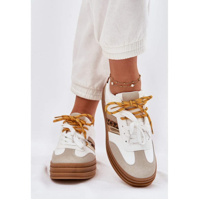 Women's sneakers on the platform with double lacing white leopard print