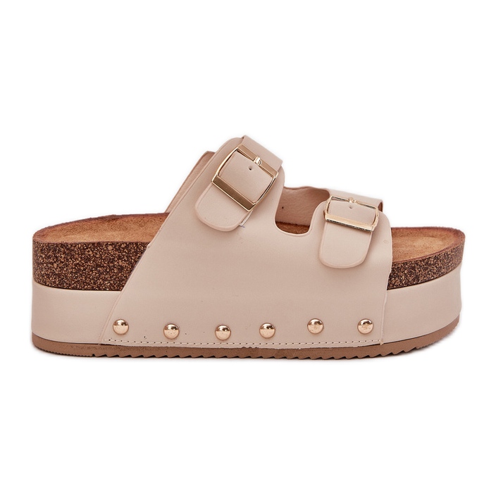 Women's flip flops with buckles on a massive platform beige