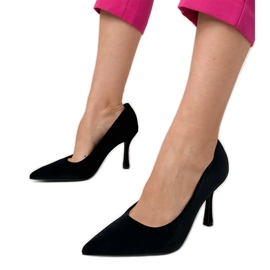 Black velor pumps on the high heel