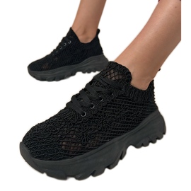 Black openwork sneakers on the platform Black openwork sneakers on the platform