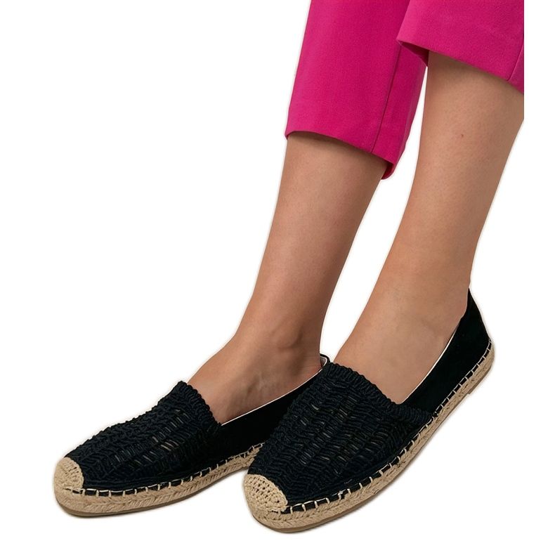 Black openwork espadrilles on the platform
