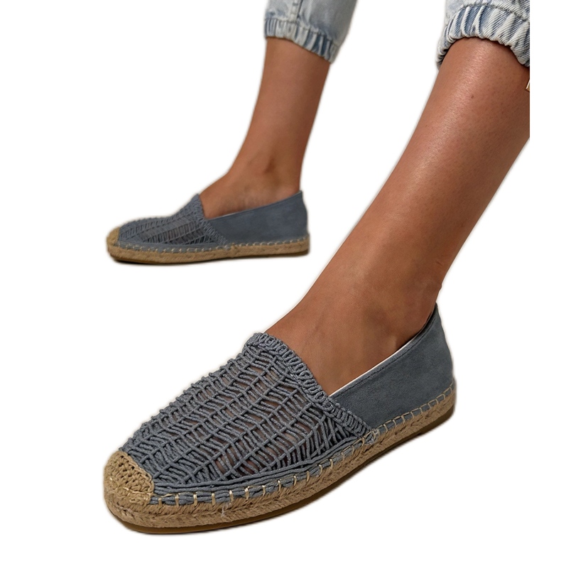 Blue openwork espadrilles on the platform
