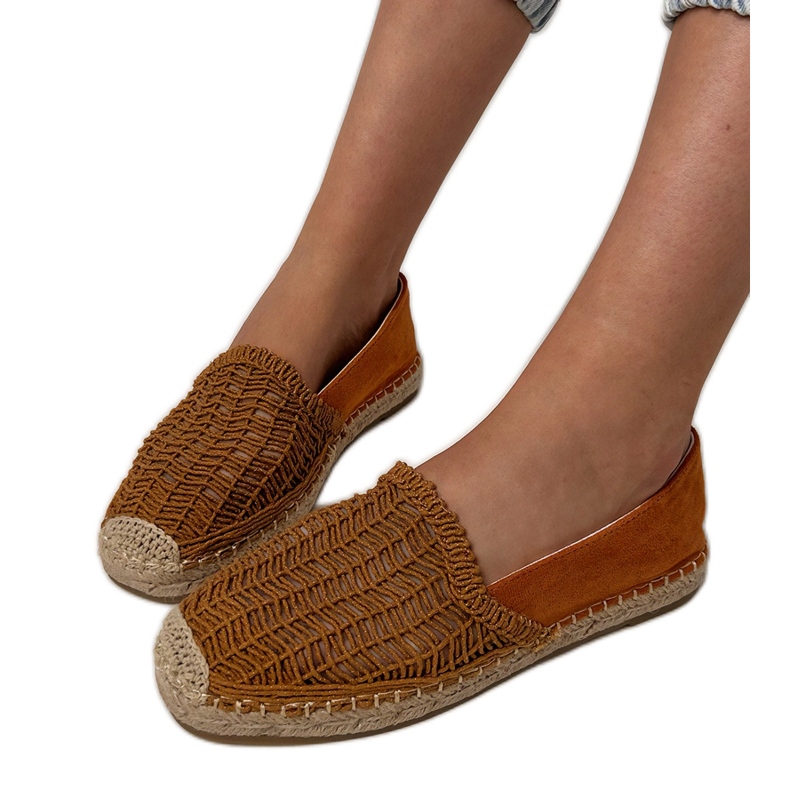 Brown openwork espadrilles on the platform