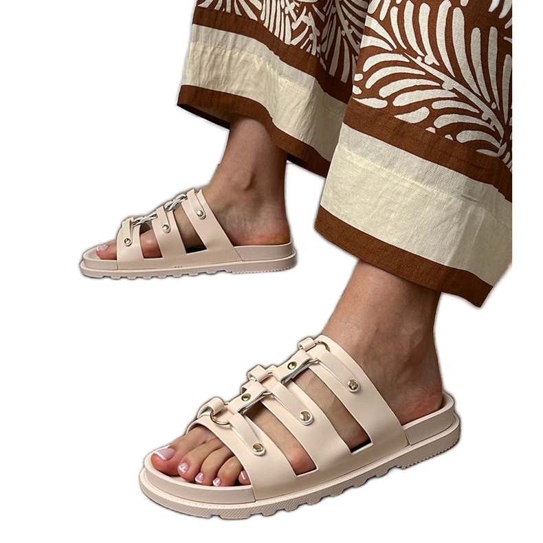 Beige Roman flip flops with studs