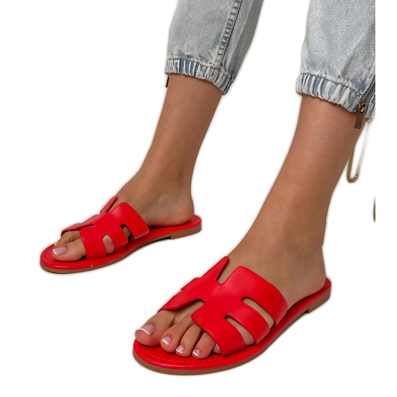 Red flip -flops decorated with cutouts
