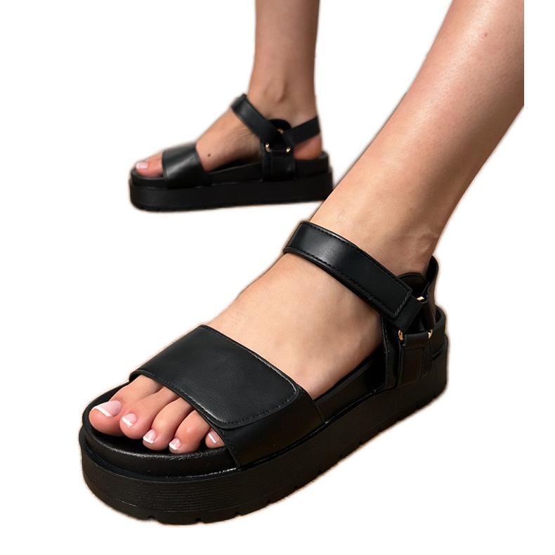Black eco -leather sandals on the platform