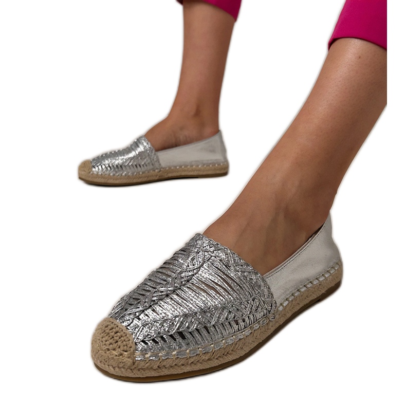 Silver openwork espadrilles on the platform