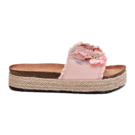 Women's slippers on the platform with flowers pink