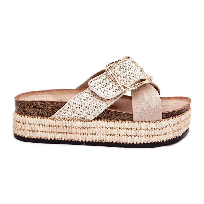 Women's slippers on the platform with braid and the golden clamp beige