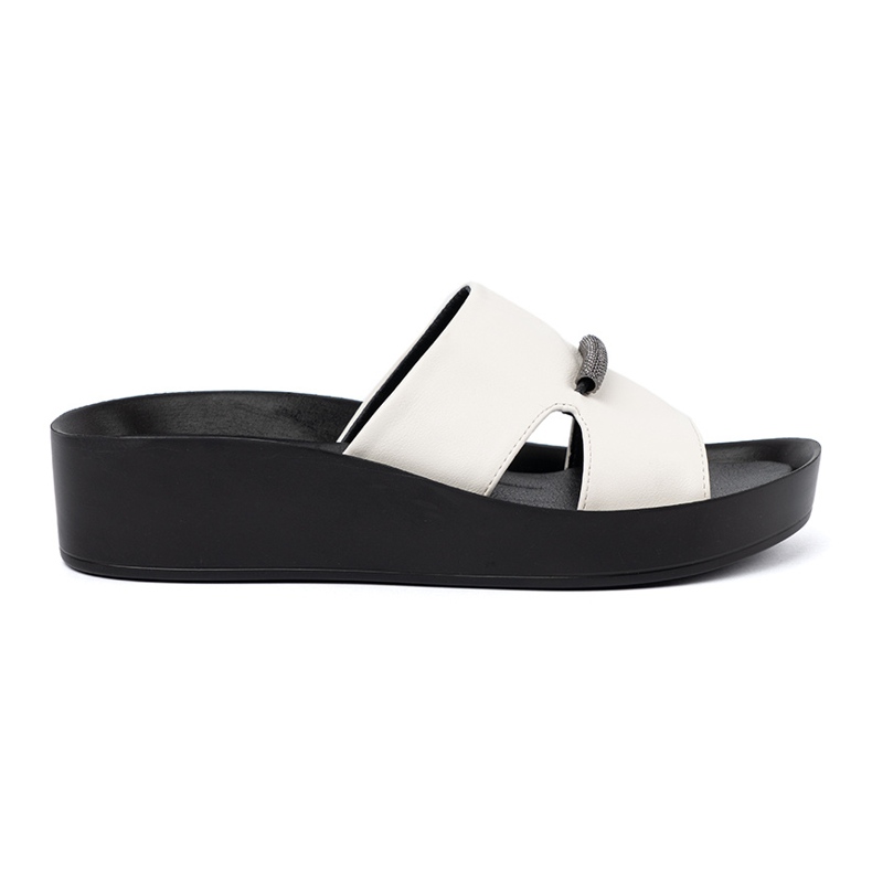 Goodin Black and white flip flops on a low wedge