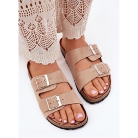 Women's flip flops on the cork platform beige buckles
