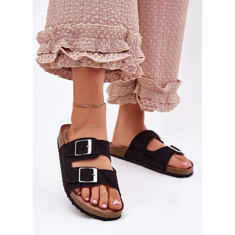 Women's flip flops on the cork platform black buckles