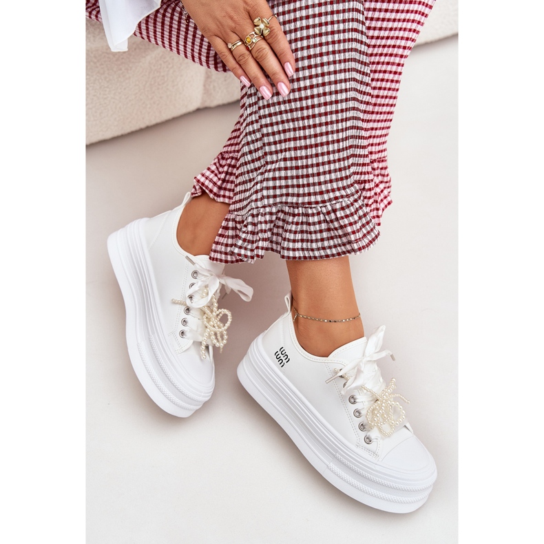 Women's sneakers on the platform with decorative lacing white Women's sneakers on the platform with decorative lacing white
