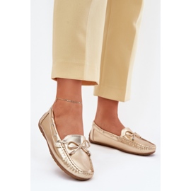 Women's eco leather golden loafers with a bow