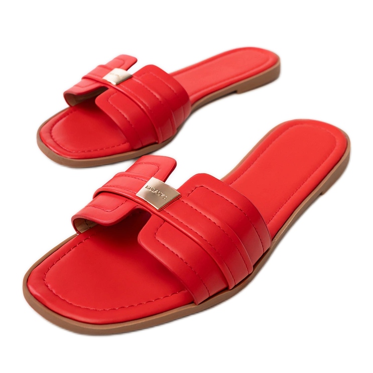 Red women's slippers with an ornament on the belt