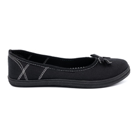 Black material ballerinas with a bow