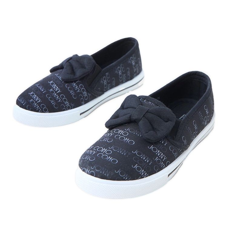 Black children's sneakers with a bow Black children's sneakers with a bow