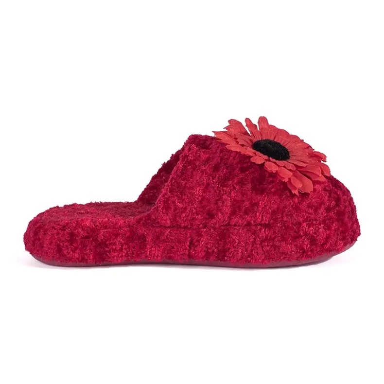 Little red slippers with a decorative flower