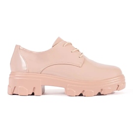 Painted laced shoes on the platform pink