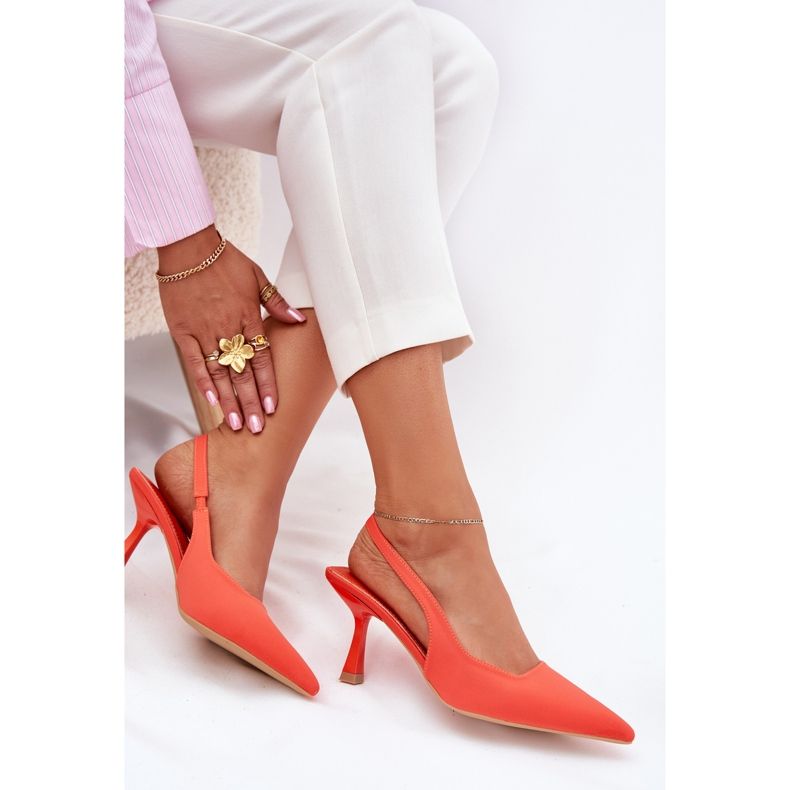 Women's sandals on an orange pin