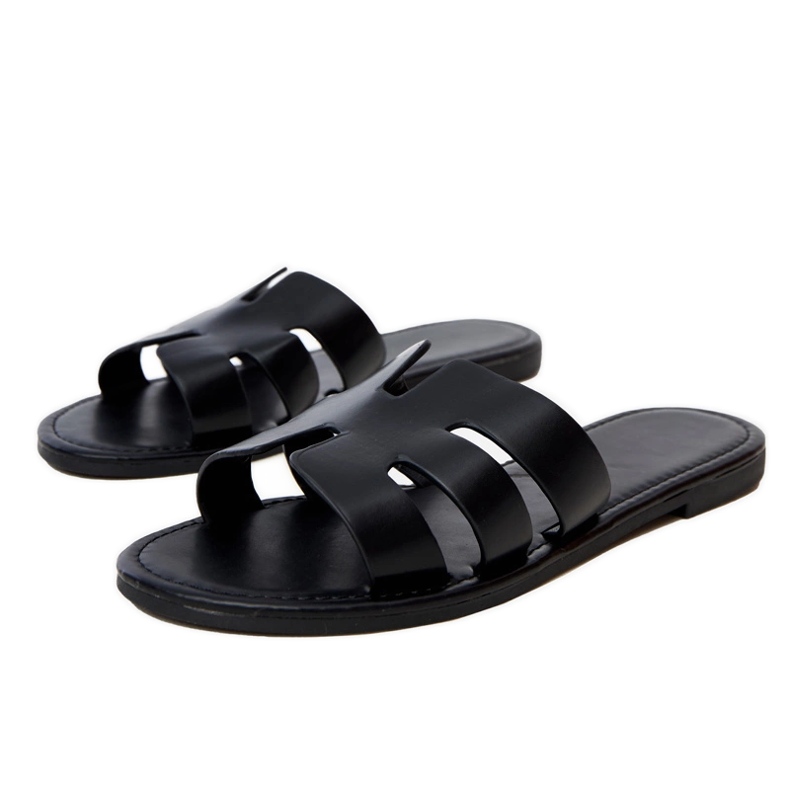 Black flip -flops decorated with cutouts