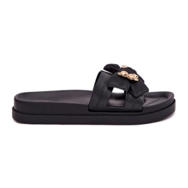 Women's slippers with a bow and a golden brooch black