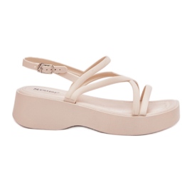 Women's sandals on the platform with light bearing stripes beige