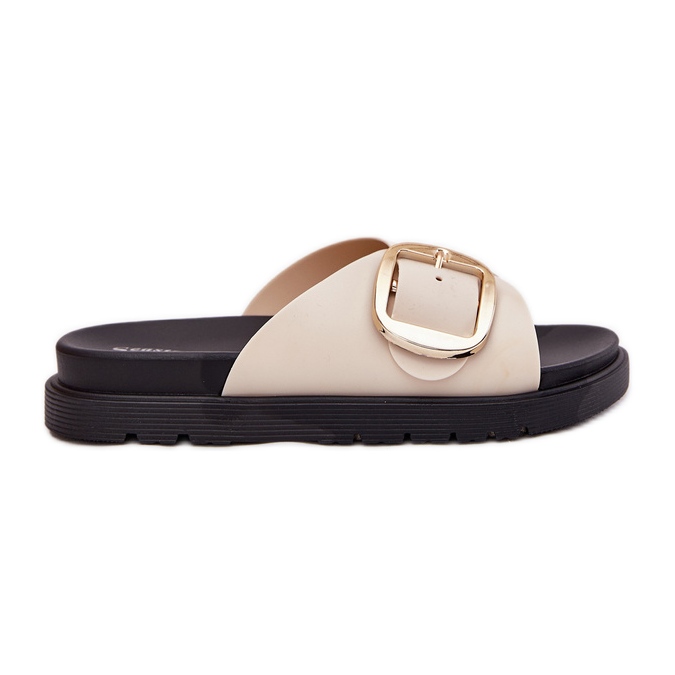 Women's slippers on the platform with a golden clamp beige