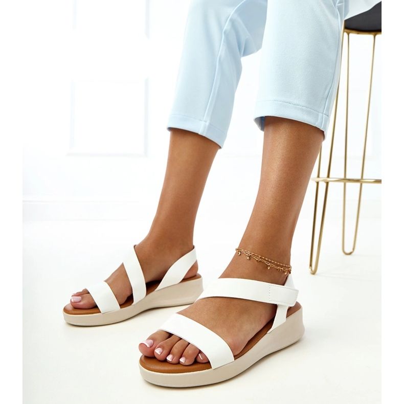 White sandals on a low wedge Verkado