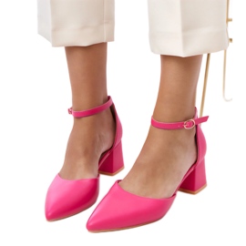 Pink pumps on the post fastened on the Keris cube