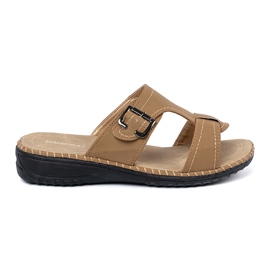 Shelvt Beige women's flip flops with silver buckles