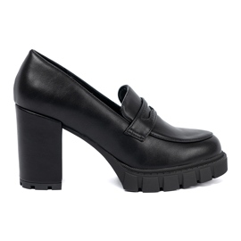 Shelvt Black Loays on a post with a trapper sole
