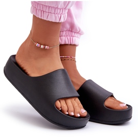 Women's flip flops on the platform black foam