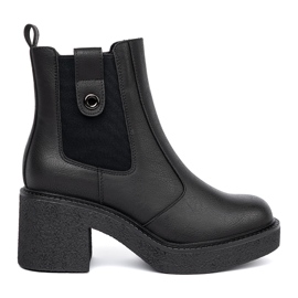 Elegant black boots with a flexible Sergio Leone insert Elegant black boots with a flexible Sergio Leone insert
