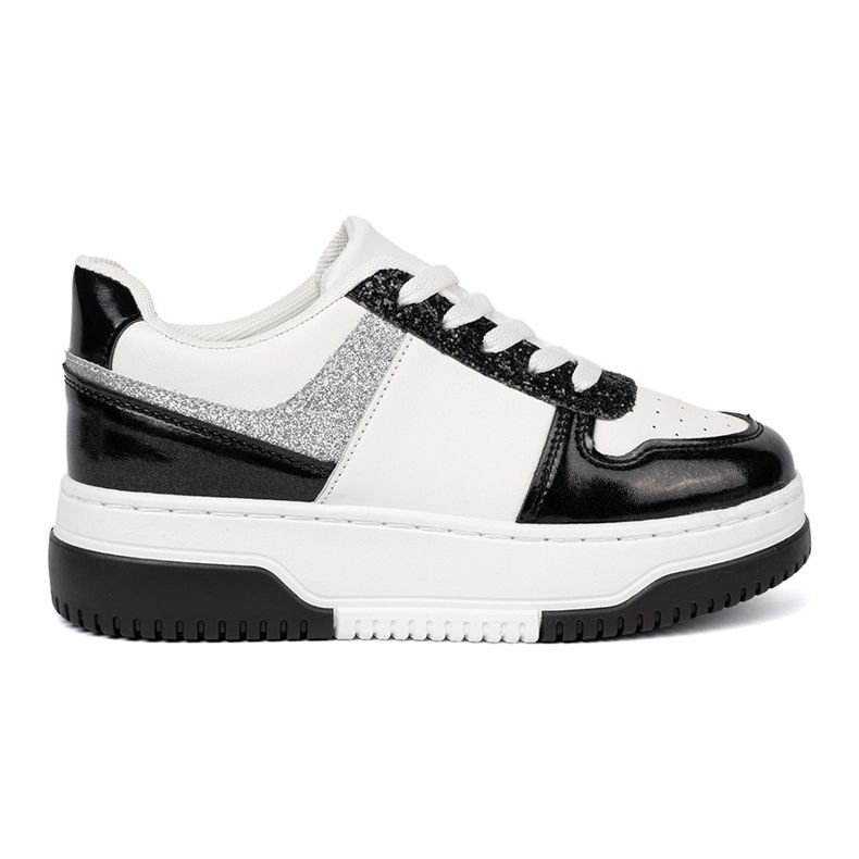Shelvt Black and white sneakers with shimmering silver details Shelvt Black and white sneakers with shimmering silver details