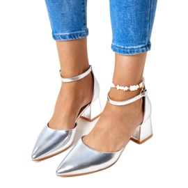 Silver pumps on the post fastened with Keris cubes