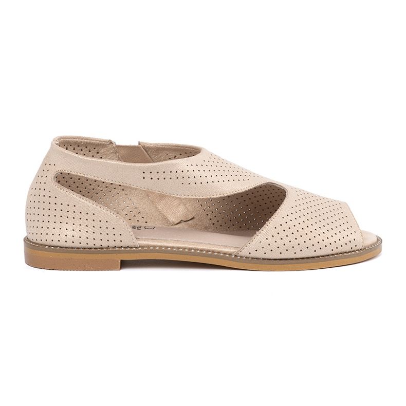 Goodin Golden sandals on a flat sole