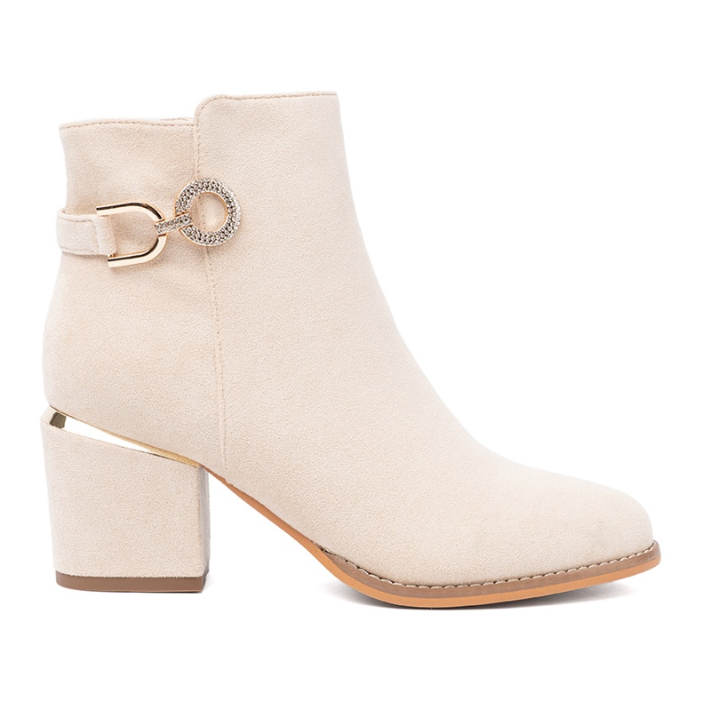 Shelvt Light beige boots on the post with a decorative clamp