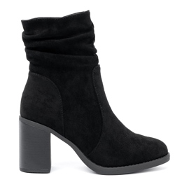 Shelvt Elegant black boots on a pillar with a crinkled upper Shelvt Elegant black boots on a pillar with a crinkled upper