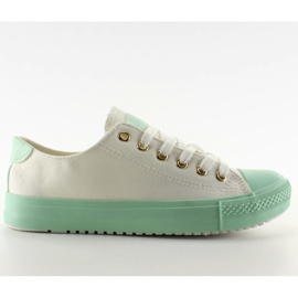 Sneakers on colorful White / Green rubber