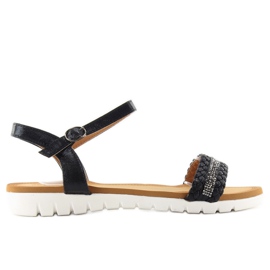 Black sandals with a metallic sheen