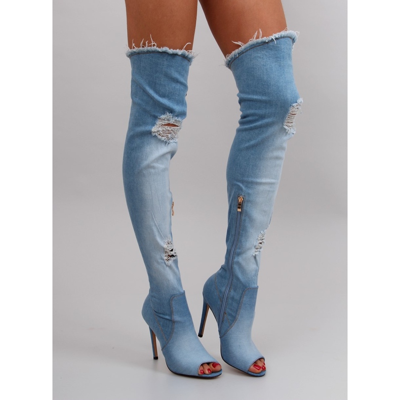 Denim thighs with blue holes