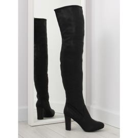Black high-heeled thigh-high boots Black high-heeled thigh-high boots