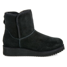 Coco Perla Mukluki on the platform black