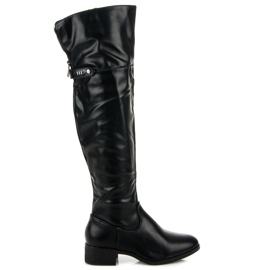 Black boots above the knee