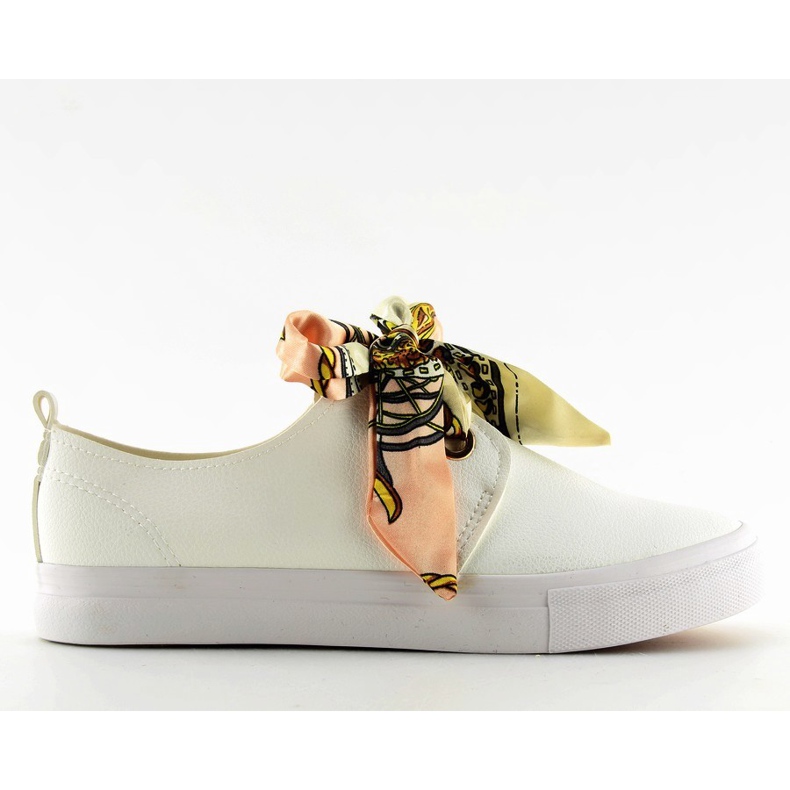 Sneakers laced with a white ribbon